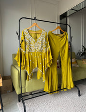 Sharvari hand work asymmetrical kurta with bell bottom pants (Make to Order)