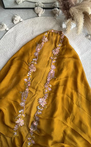 Sonia padded blouse with cowl skirt and cape