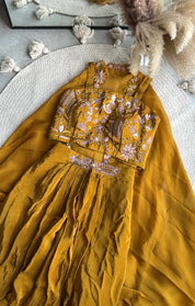 Sonia padded blouse with cowl skirt and cape