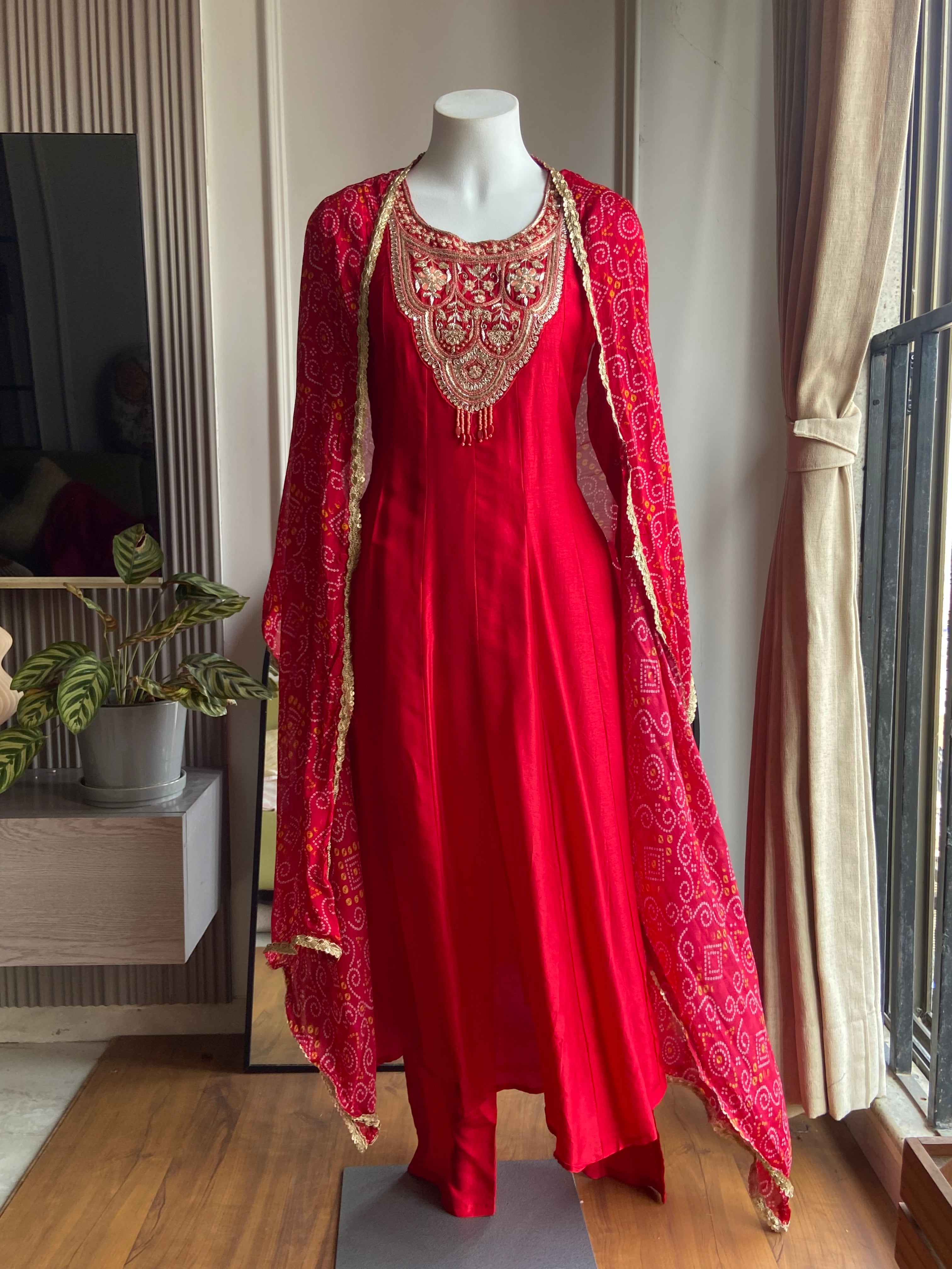 Nishita Embellished suit set with bandhani style-red