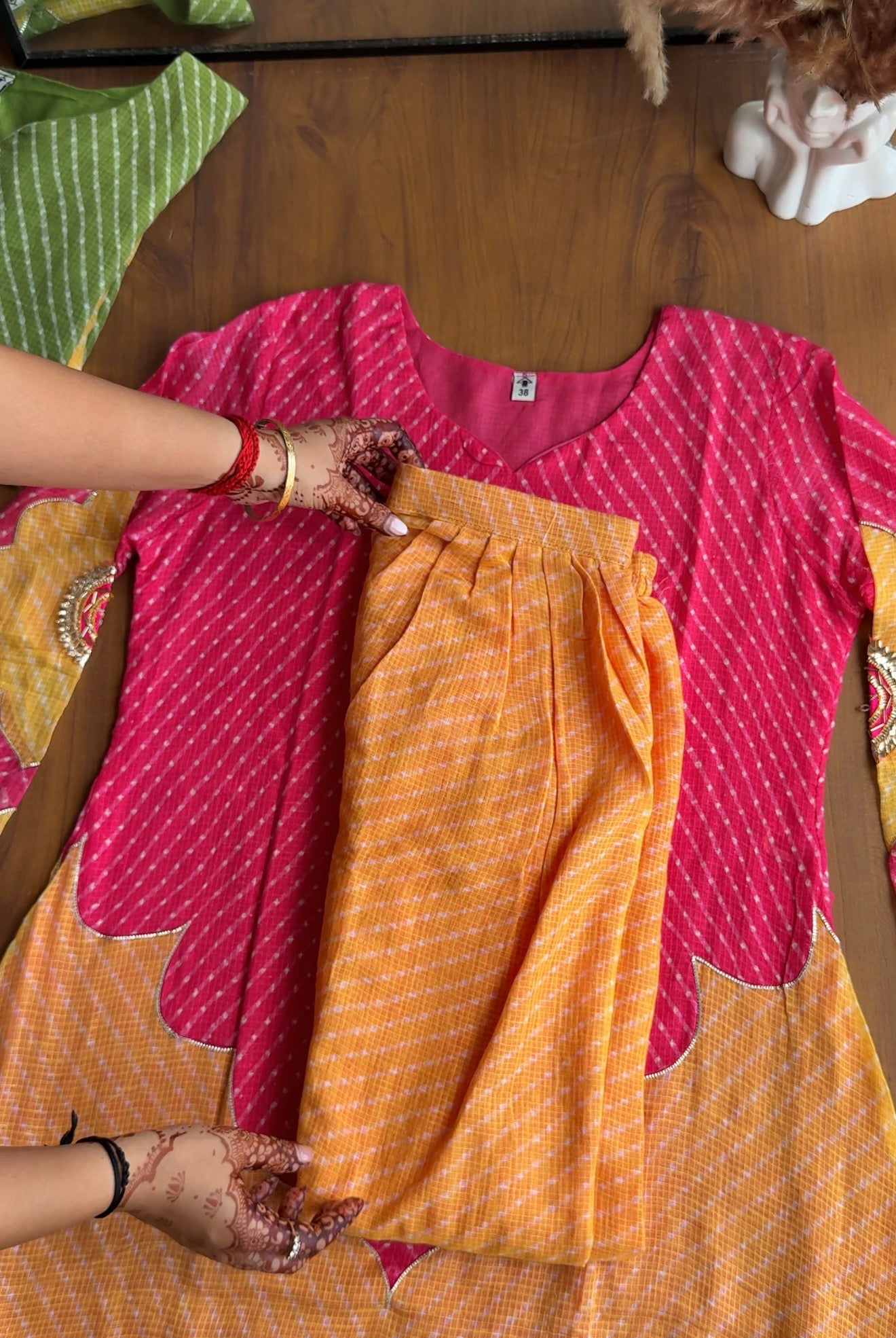 Kajol Bandhani Short Kurta Paired With Breezy Kota Doriya Farshi Pants- Pink