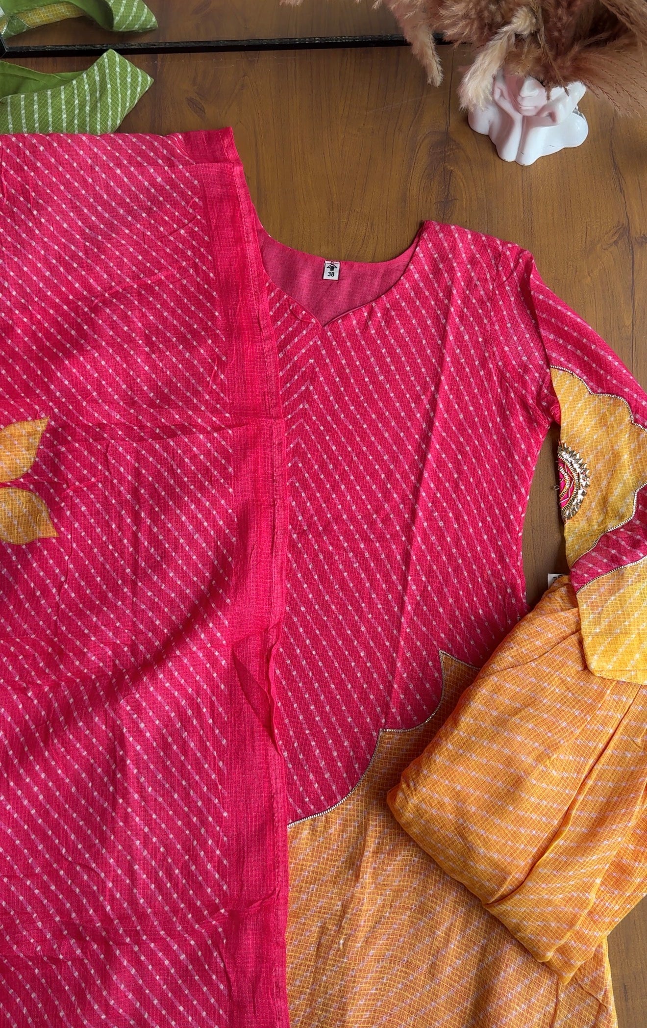 Kajol Bandhani Short Kurta Paired With Breezy Kota Doriya Farshi Pants- Pink