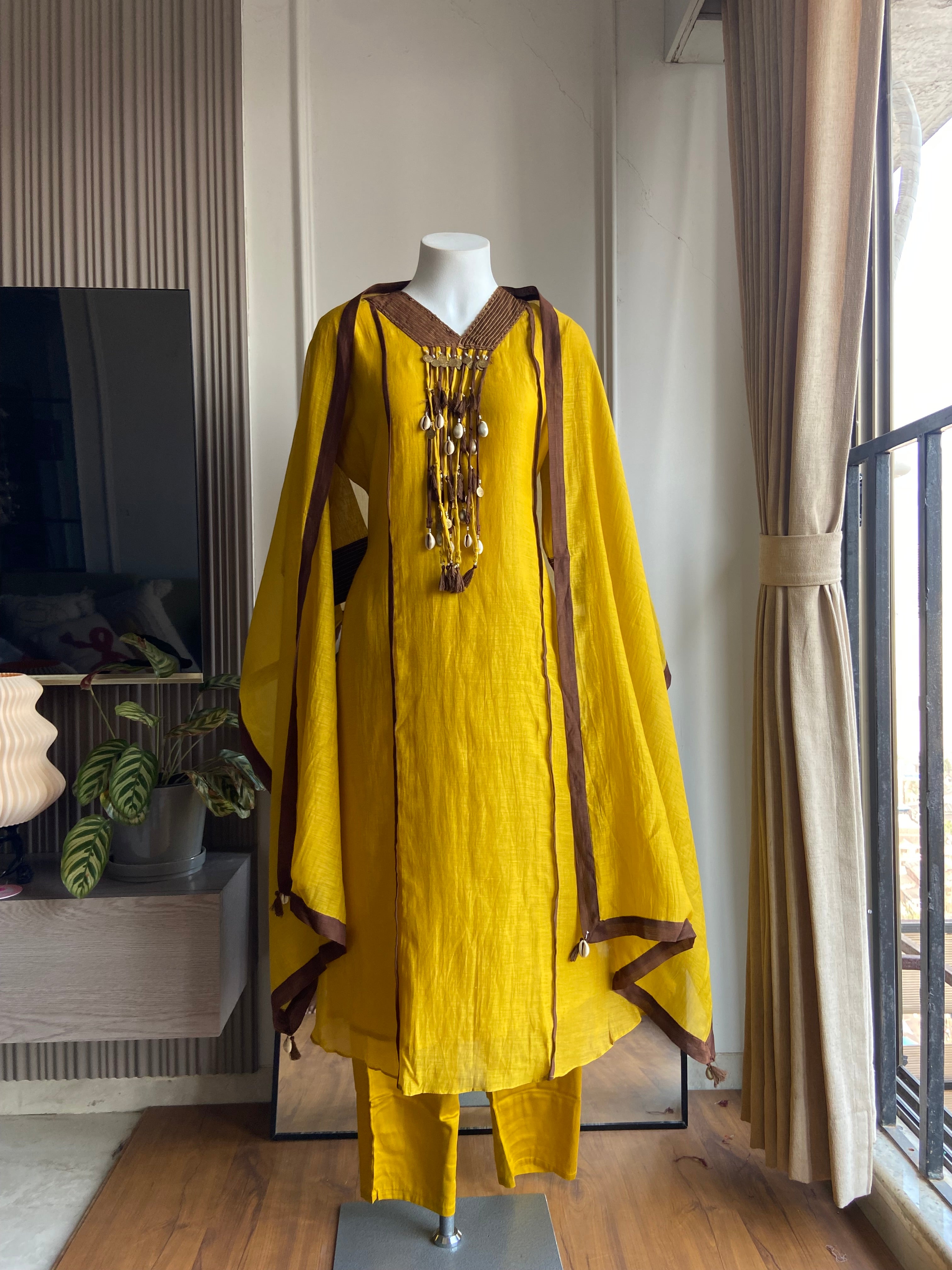 Arohi Tassel And Kaudi Latkan Dress- Yellow