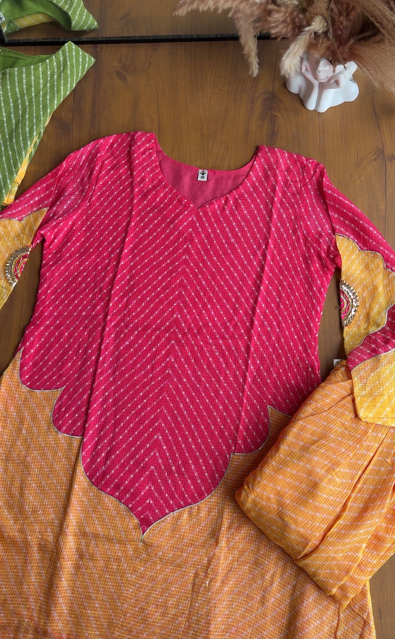 Kajol Bandhani Short Kurta Paired With Breezy Kota Doriya Farshi Pants- Pink