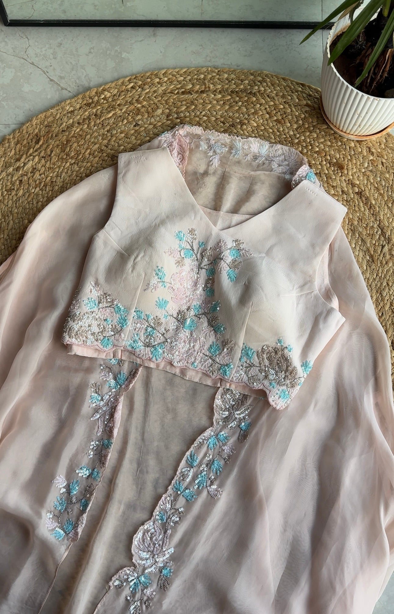 Kajal hand work padded blouse with cowl skirt and Cape jacket