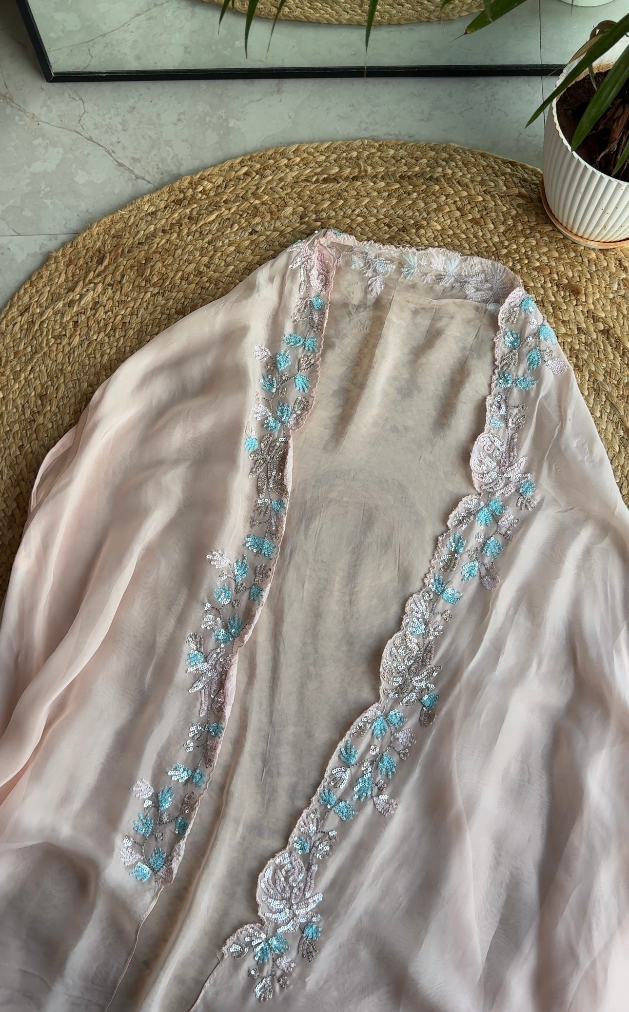 Kajal hand work padded blouse with cowl skirt and Cape jacket